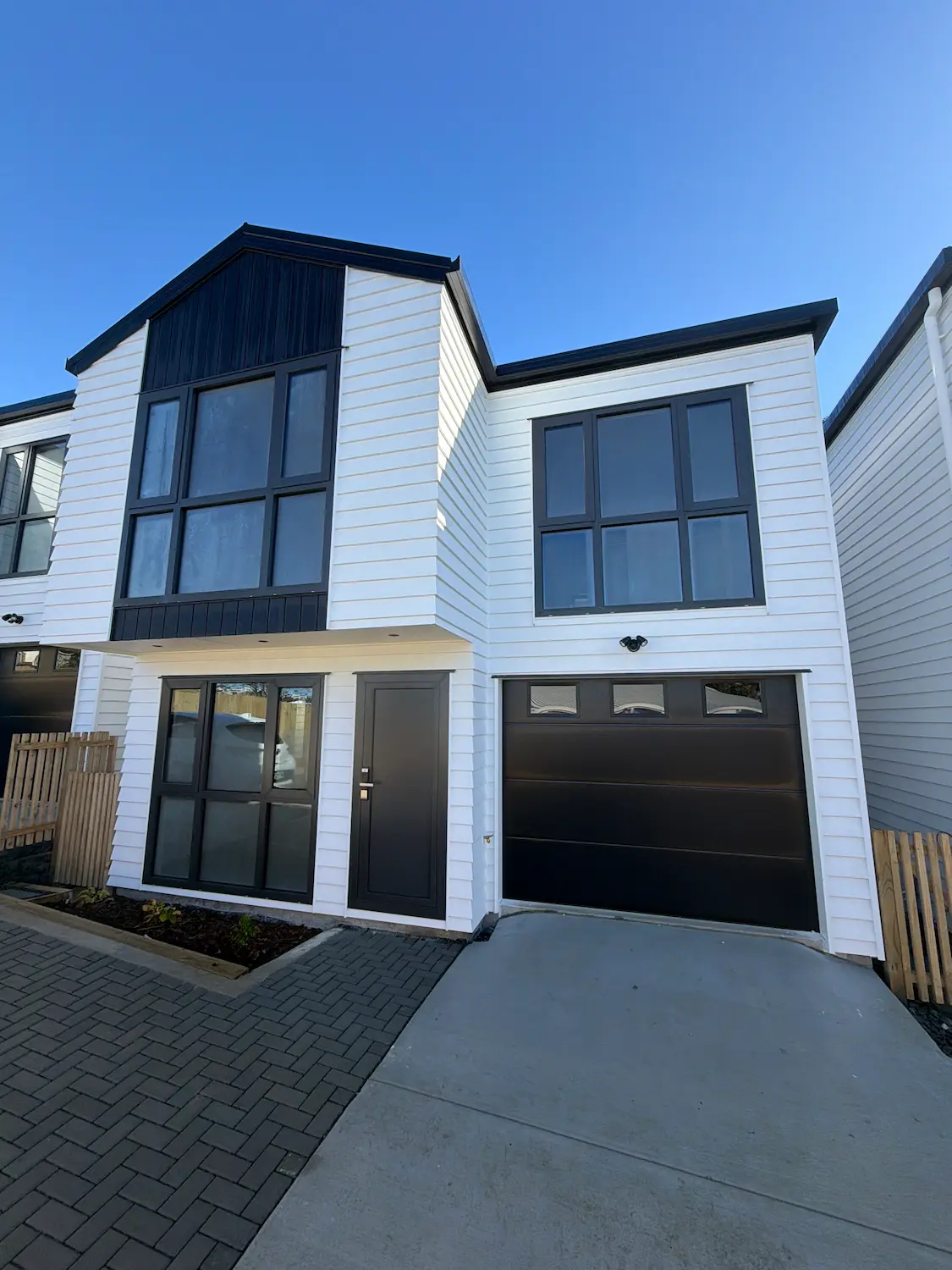 Brand-new two-storey standalone Auckland townhouse during independent building inspection